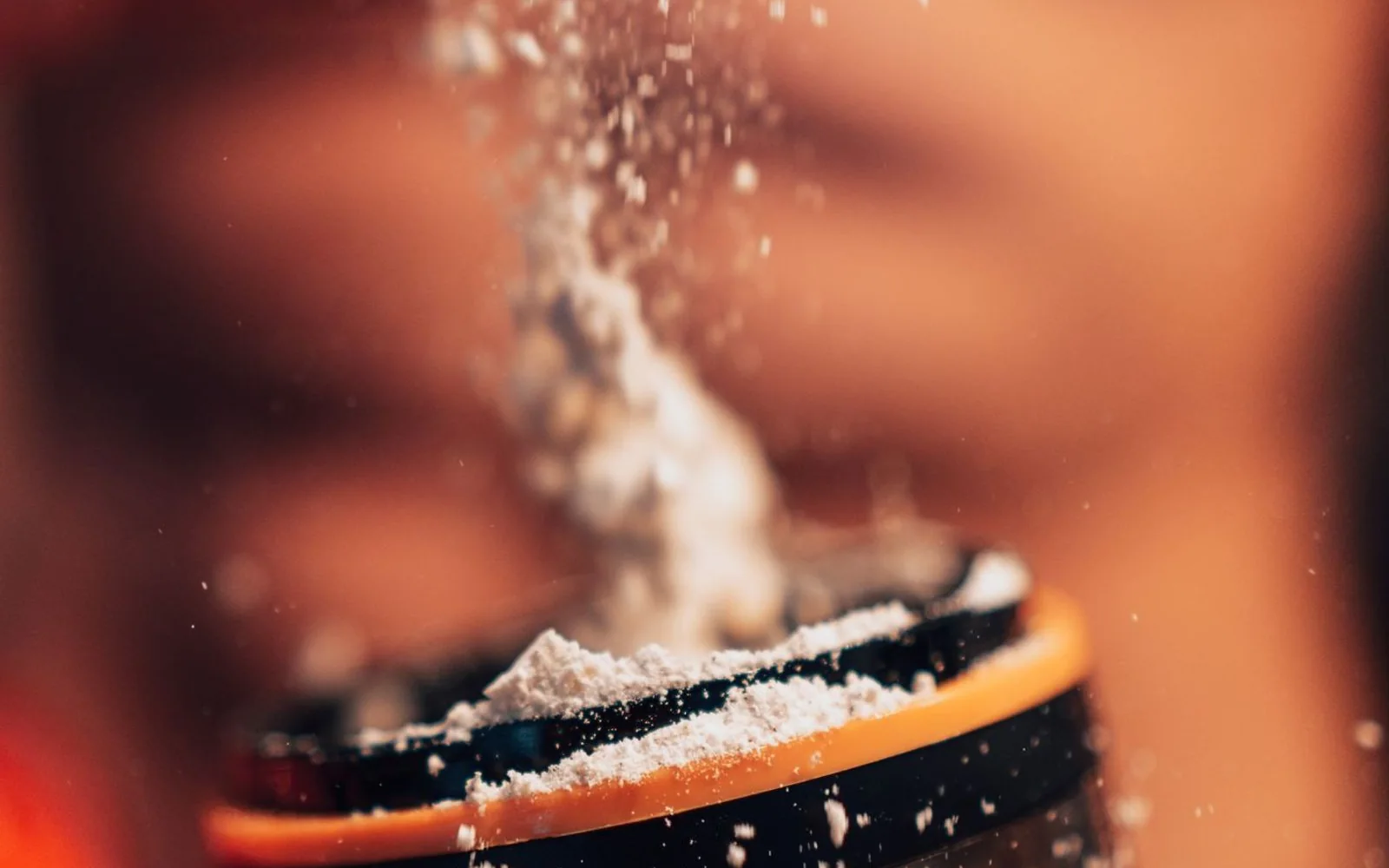Protein/supplement powder in a shaker